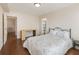 Bedroom with hardwood floors, walk-in closet and desk at 2479 Peachtree Ne Rd # 407, Atlanta, GA 30305