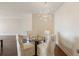 Bright dining area with a modern light fixture and elegant chairs around a glass table at 2479 Peachtree Ne Rd # 407, Atlanta, GA 30305
