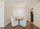 Cozy dining room with hardwood floors, chandelier, and space for a table with four chairs at 2479 Peachtree Ne Rd # 407, Atlanta, GA 30305
