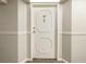 Condo front entrance door features a classic design with a decorative door knocker and unit number at 2479 Peachtree Ne Rd # 407, Atlanta, GA 30305