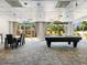 Inviting game room with a pool table and dining table, offering ample space for socializing and enjoying leisure time at 2479 Peachtree Ne Rd # 407, Atlanta, GA 30305