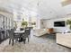 Game and lounge area with pool table, dining table, and comfortable sofas offering multiple entertainment options at 2479 Peachtree Ne Rd # 407, Atlanta, GA 30305