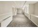 Hallway with carpeted floor and white walls at 2479 Peachtree Ne Rd # 407, Atlanta, GA 30305