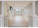 Hallway with tile floor, pillars, and elevator doors at 2479 Peachtree Ne Rd # 407, Atlanta, GA 30305