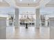 Elegant building lobby featuring tiled floors, decorative columns, and a view to the outside at 2479 Peachtree Ne Rd # 407, Atlanta, GA 30305