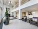 Elegant building lobby with high ceilings, comfortable seating, and a concierge desk for resident convenience at 2479 Peachtree Ne Rd # 407, Atlanta, GA 30305