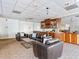 Relaxing lounge featuring soft leather seating, a coffee table, and dark wood cabinetry perfect for socializing at 2479 Peachtree Ne Rd # 407, Atlanta, GA 30305