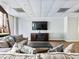 Cozy lounge area with comfortable seating, a large TV, and a stylish entertainment center at 2479 Peachtree Ne Rd # 407, Atlanta, GA 30305