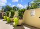 Exterior shot highlighting the manicured outdoor patio, accented with ornamental plants at 2479 Peachtree Ne Rd # 407, Atlanta, GA 30305