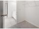 Bright walk-in closet with carpet and wire shelving providing efficient storage space at 3258 Durston Ct, Dacula, GA 30019