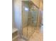 Luxurious bathroom featuring a glass enclosed shower with marble tiling, offering a spa-like experience at 407 Westmarch Cir, Loganville, GA 30052