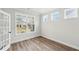 Cozy office space with wood floors, natural light, and a view of the neighborhood at 407 Westmarch Cir, Loganville, GA 30052