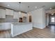 Well-appointed kitchen featuring a granite island and ample cabinet space at 414 Westmarch Cir, Loganville, GA 30052