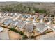Aerial view of a neighborhood featuring well-maintained homes and landscaping at 505 Flyingbolt Run, Canton, GA 30115