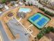 Community amenities include a swimming pool, clubhouse, tennis courts, playground, and parking at 505 Flyingbolt Run, Canton, GA 30115