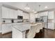 Modern kitchen featuring granite countertops, stainless steel appliances, and a spacious center island at 505 Flyingbolt Run, Canton, GA 30115