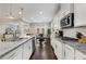Well-appointed kitchen featuring granite countertops, stainless steel appliances, and ample counter space at 505 Flyingbolt Run, Canton, GA 30115