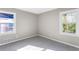 Well-lit bedroom with new carpet and large windows at 2745 Fairlane Se Dr, Atlanta, GA 30354