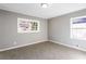 Spacious bedroom with new carpet and large windows at 2745 Fairlane Se Dr, Atlanta, GA 30354