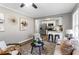 Open living room with kitchen access, contemporary style, and comfy seating at 2745 Fairlane Se Dr, Atlanta, GA 30354