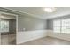 Bright dining area with gray walls and white wainscoting at 4332 Abram Dr, Conley, GA 30288