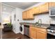 Kitchen with stainless steel appliances and wood cabinets at 1355 Euclid Ne Ave # 14A, Atlanta, GA 30307