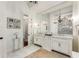 Elegant bathroom with double vanity and marble floors at 4706 Powers Ferry Rd, Atlanta, GA 30327