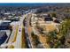 Aerial view of a neighborhood near a roadway and train tracks at 6531 Temple St, Lithia Springs, GA 30122