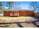 Brick home with wooden deck and spacious backyard at 6531 Temple St, Lithia Springs, GA 30122