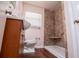 Updated bathroom with walk-in shower and toilet at 6531 Temple St, Lithia Springs, GA 30122
