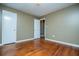 Bright bedroom featuring hardwood floors and an open layout at 6531 Temple St, Lithia Springs, GA 30122