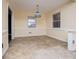 Spacious dining room featuring updated flooring and a ceiling light fixture at 6531 Temple St, Lithia Springs, GA 30122