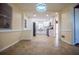 Bright dining area with views into the updated kitchen at 6531 Temple St, Lithia Springs, GA 30122