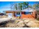 Brick ranch house with a spacious yard and attached garage at 6531 Temple St, Lithia Springs, GA 30122