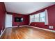 Spacious living room with hardwood floors and large windows at 6531 Temple St, Lithia Springs, GA 30122