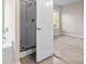 Bathroom features a glass shower and tile flooring at 7116 Fringe Flower Dr # 19, Austell, GA 30168