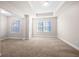 Bedroom with carpet, natural light and tray ceiling at 7116 Fringe Flower Dr # 19, Austell, GA 30168