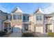 Charming townhome with brick accents, attached garage, and well-maintained landscaping at 7116 Fringe Flower Dr # 19, Austell, GA 30168