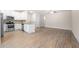 Modern kitchen open to the living area with stainless steel appliances at 7116 Fringe Flower Dr # 19, Austell, GA 30168