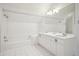 Bright bathroom with double vanity and bathtub at 1328 Harvard Ne Rd, Atlanta, GA 30306