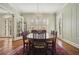 Formal dining room with hardwood floors, large windows and chandelier at 1328 Harvard Ne Rd, Atlanta, GA 30306