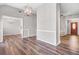 Dining room with hardwood floors and chandelier at 215 Prominent Loop, Mcdonough, GA 30253