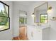 Modern bathroom with white vanity and gold accents at 2172 Briarlake Ne Trce, Atlanta, GA 30345