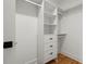 Spacious closet with shelves and hanging rods at 2172 Briarlake Ne Trce, Atlanta, GA 30345