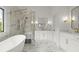 Luxurious bathroom with marble finishes, soaking tub and shower at 2172 Briarlake Ne Trce, Atlanta, GA 30345