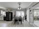 Kitchen dining area with table, chairs, and hardwood floors at 2820 Ashton Tree Ct, Dacula, GA 30019