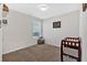 Simple bedroom with crib and window overlooking backyard at 287 Cynthia Ct, Dallas, GA 30157