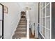 Carpeted staircase leading to the upper level at 287 Cynthia Ct, Dallas, GA 30157