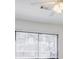 Bedroom featuring a ceiling fan and window with blinds at 3318 Northcrest Rd # D, Atlanta, GA 30340