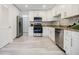 Updated kitchen with stainless steel appliances and granite countertops at 3318 Northcrest Rd # D, Atlanta, GA 30340